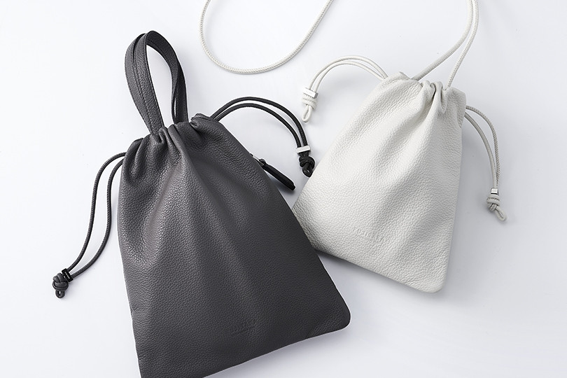 Nomadsオリジナル グリーン ドローストリングバッグ - 冒険と普段使いに！